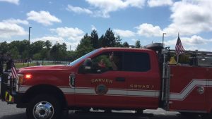 Firefighter driving fire truck vehicle