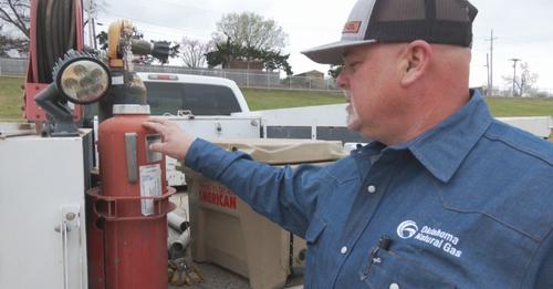 Man discusses using a fire extinguisher to help put out fire after crash