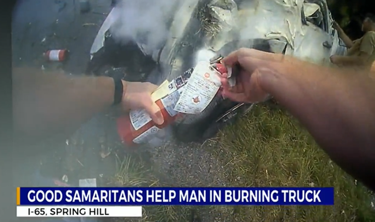 drivers help rescue man from burning truck